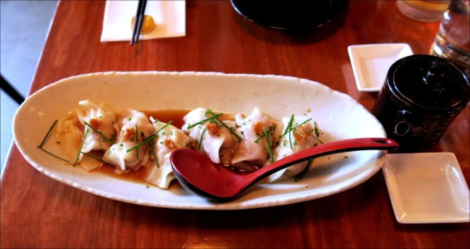 Prawn and chicken wontons with ponzu and chives